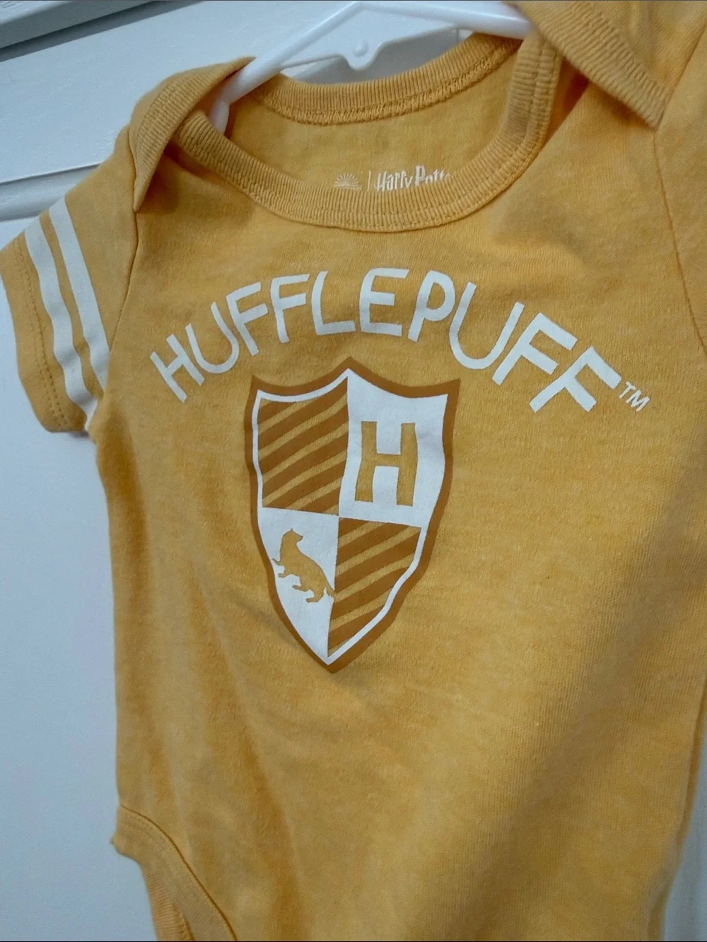 Warner Bros. Hufflepuff Yellow Baby Bodysuit with White Stripes